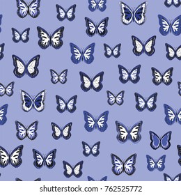 Seamless background from bright butterflies. Beautiful colorful butterflies chaotically fly. Seamless multicolored background with flying moths. Suitable for fabric, paper, packaging.