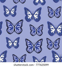 Seamless background from bright butterflies. Beautiful colorful butterflies chaotically fly. Seamless multicolored background with flying moths. Suitable for fabric, paper, packaging.