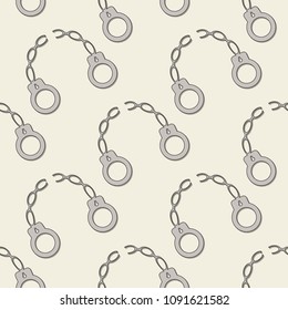 seamless background of broken handcuffs