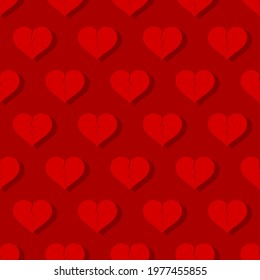 Seamless background with broken hearts in red tons.