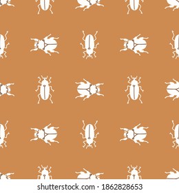 Seamless background bug insect gender neutral pattern. Whimsical minimal earthy 2 tone color. kids nursery wallpaper or boho cartoon insect beetle fashion all over print.
