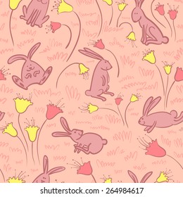 Seamless background with bunnies and flowers