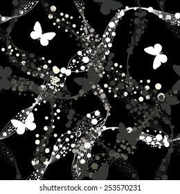 Seamless background with butterflies beads. Vector
