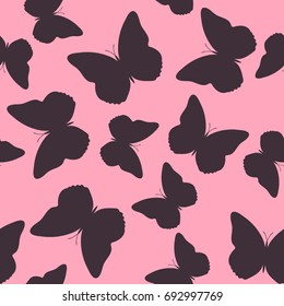 Seamless background from butterflies. Beautiful butterflies chaotically fly randomly. Vector. Suitable for fabric, paper, packaging.