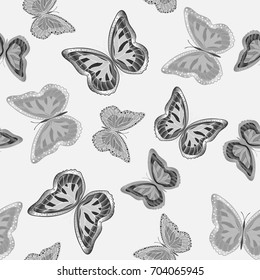 Seamless background from butterflies. Beautiful butterflies chaotically fly randomly. Vector. Suitable for fabric, paper, packaging.