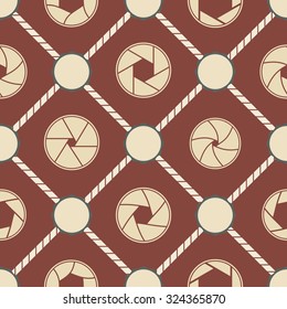 Seamless background with camera shutter symbols for your design