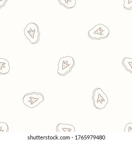 Seamless background carnivore dinosaur foot print fossil gender neutral baby pattern. Simple whimsical minimal earthy 2 tone color. Kids nursery wallpaper or boho cartoon animal fashion all over.