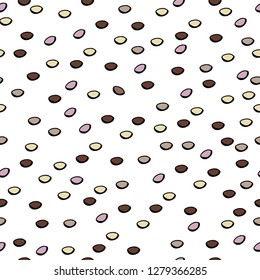 seamless background with chocolate round candies. Pink, brown, chocolate, milky color.