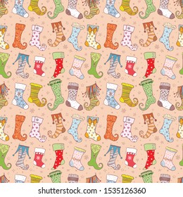 Seamless background with christmas gift socks on neutral peach background. Can be used for wallpaper, pattern fills, textile, web page background, surface textures