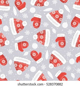 Seamless background of Christmas hats and mittens. Decorated with Christmas toys and snowflakes.