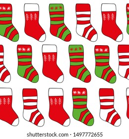 Seamless background Christmas Socks on the white background. New Year and Christmas background with bright striped socks of red and green color.