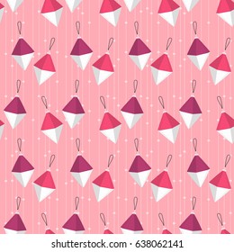 Seamless background of Christmas toys and beads. Pattern.
