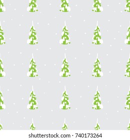 Seamless background with Christmas trees in a winter forest
