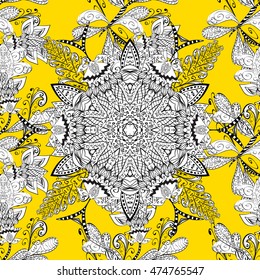 Seamless background. Circle flower mandalas seamless pattern in black white and yellow, vector