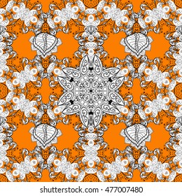 Seamless background. Circle flower mandalas seamless pattern in black white and orange, vector