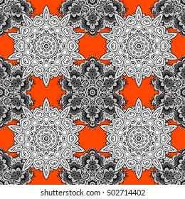 Seamless background. Circle flower mandalas seamless pattern in black white and yellow, orange, vector