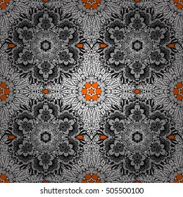 Seamless background. Circle flower mandalas seamless pattern in black white and yellow, orange, red, vector