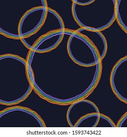 Seamless background, circles, and rainbow colors. Black background. Perfect for invitations, postcards, decor, kids celebrations, and more.