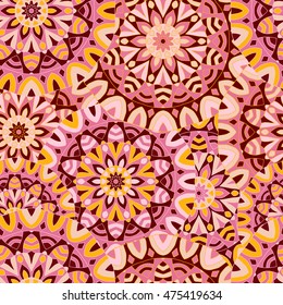 Seamless background with circular symmetrical mandalas. Texture to print on fabric, Wallpaper, clothes.
