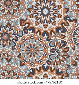 Seamless background with circular symmetrical mandalas. Ethnic pattern in Greek, Turkish, Islamic style.