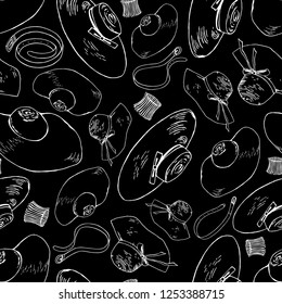 Seamless background of clothing accessories. Hats, belts and bracelets in white outline on black background.