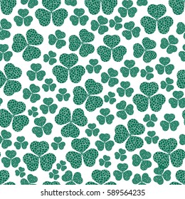 Seamless background with clover. The symbol of St. Patrick's Day. Green vector pattern. EPS 10