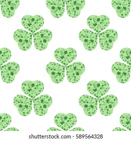 Seamless background with clover. The symbol of St. Patrick's Day. Green vector pattern. EPS 10