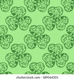 Seamless background with clover. The symbol of St. Patrick's Day. Green vector pattern. EPS 10