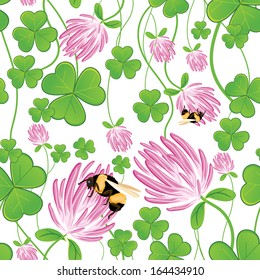 Seamless background with clovers