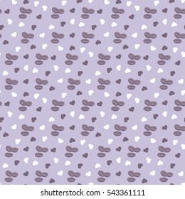 Seamless background with coffee grains and hearts