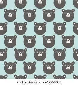 Seamless background with color funny bear heads. Vector illustration