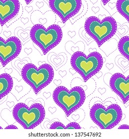 Seamless background with color hearts