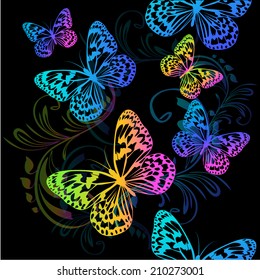 seamless background of colored butterflies on a black background. vector