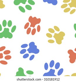 Seamless background with colorful cat tracks for creating card, web page background, wallpaper and textile.