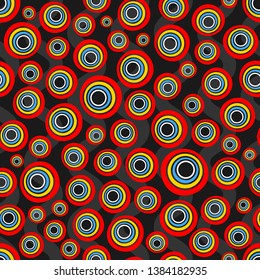Seamless background of concentric circles in neon rainbow colors on black. Retro pattern, inspired by the 60s.