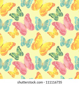 seamless background consisting of colored butterflies