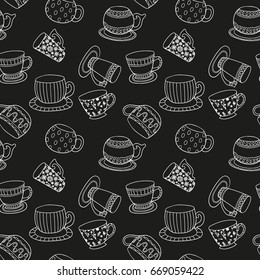 Seamless background - cups on chalkboard. Black teatime pattern