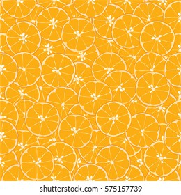 Seamless background with cut oranges