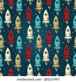 seamless background with cute doodle rockets and stars, vector illustration