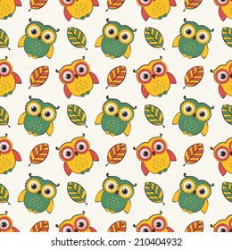 Seamless background with cute owls and leaves. Vector pattern.