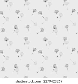 Seamless background from a dandelion. Flight of a dandelion, seeds fly from the wind