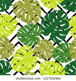 Seamless background with decorative leaves. Brushwork. Texture of Monstera leaves. Background zigzag. Textile rapport.