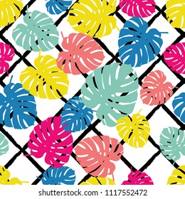 Seamless background with decorative leaves. Brushwork. Texture of Monstera leaves. Background zigzag. Textile rapport.