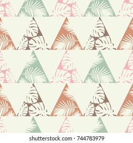 Seamless background with decorative leaves. Monstera leaves in triangles. Pattern with Monstera leaves. Textile rapport.