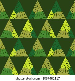 Seamless background with decorative leaves. Texture of palm leaves in triangles. Textile rapport.