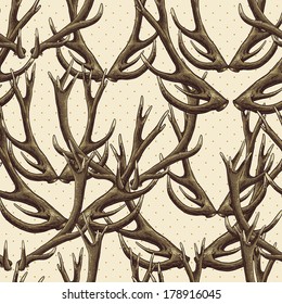 Seamless background with deer antlers