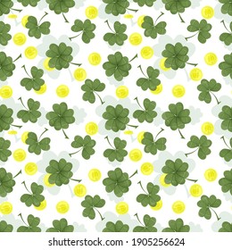 Seamless background for the design design, on the theme of the St. Patricks Day holiday, randomly arranged clover leaves and gold coins
