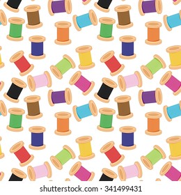 seamless background with different colors thread bobbins
