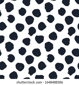 Seamless background of different spots. Hand-drawn illustration