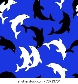 Seamless background with dolphins in blue water